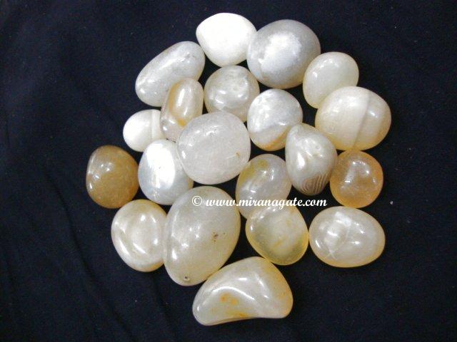 Manufacturers Exporters and Wholesale Suppliers of Navrang Agate Tambled Khambhat Gujarat